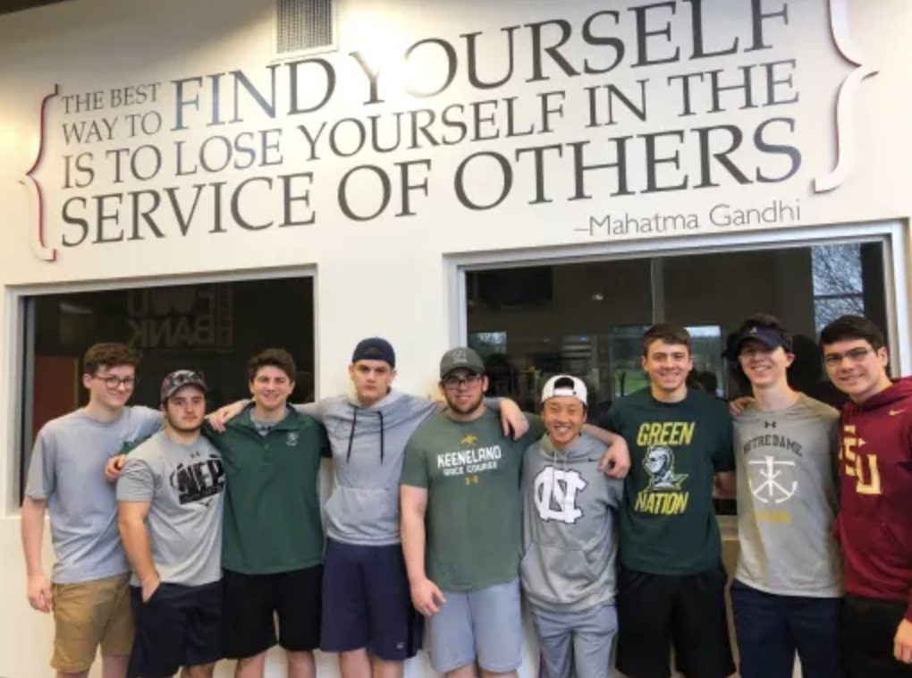 students standing in front of service quote
